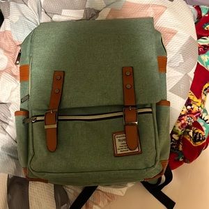 Green book bag with charging case (batteries not included)flip top.